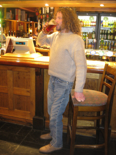 Steve standing in his local with a pint of real ale